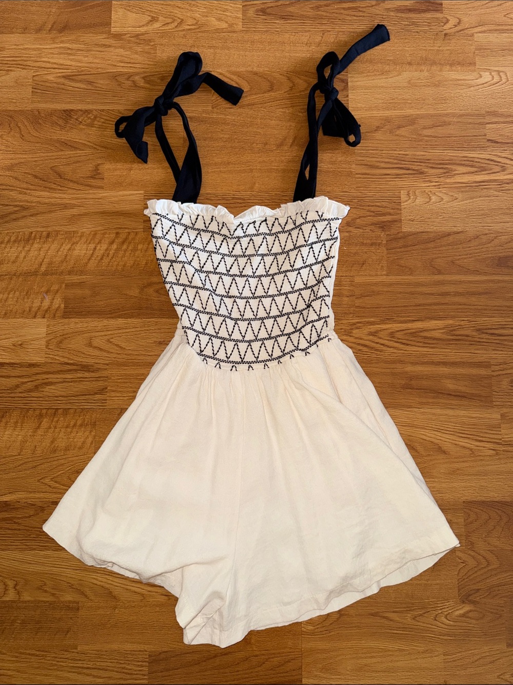 Francesca’s Smocked Romper with Black Bow Straps